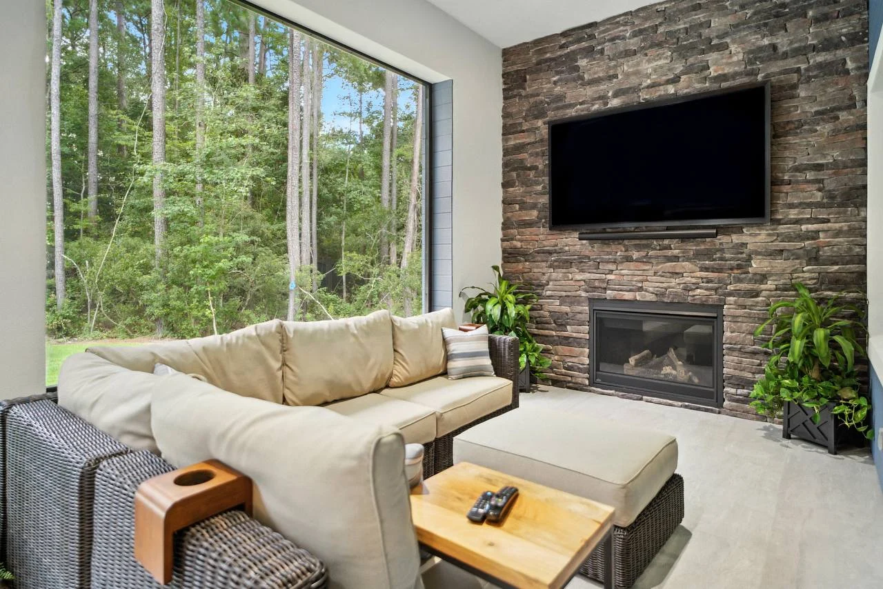 Luxury fireplace wall with custom built-ins and modern Lowcountry interior design