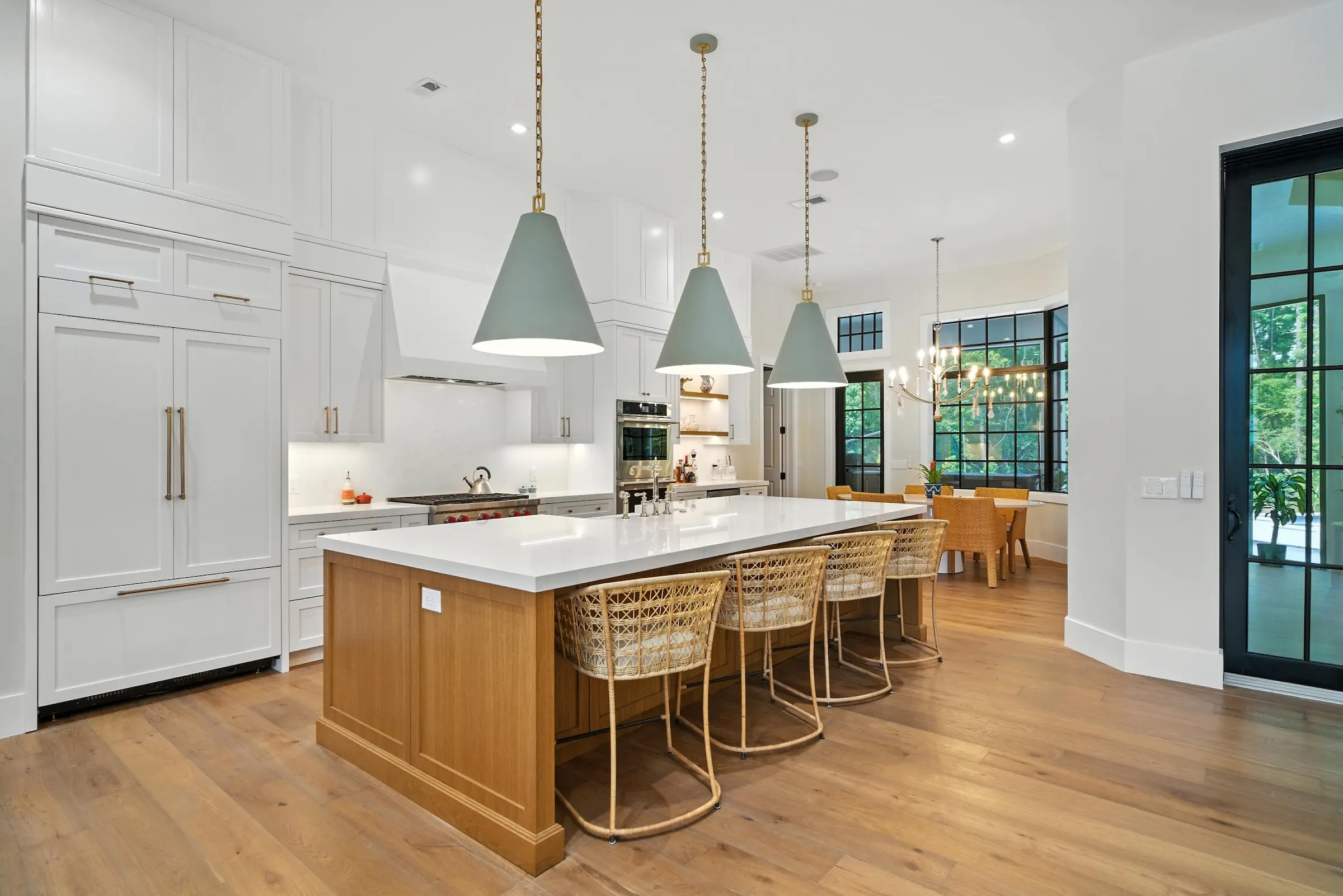 Coastal Craft completed kitchen and dining area with wood island