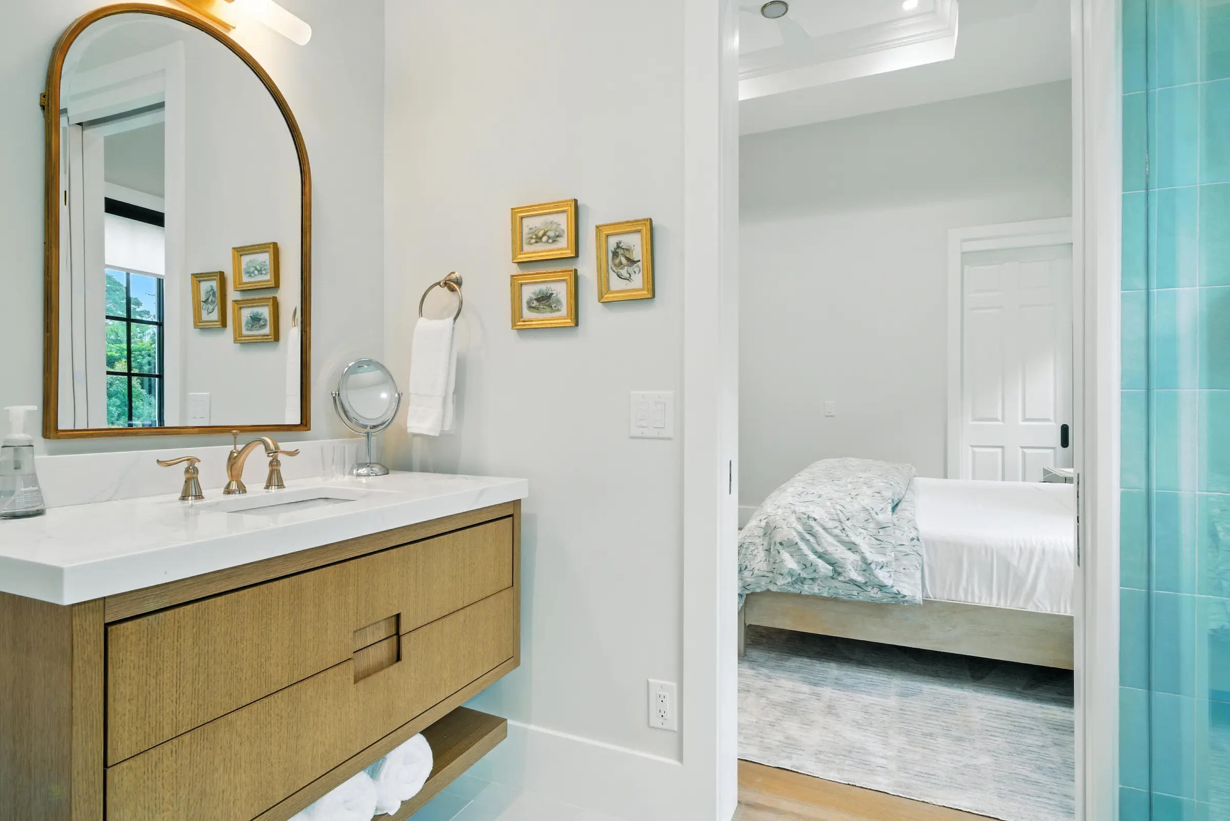 Coastal Craft completed bathroom vanity beside bedroom