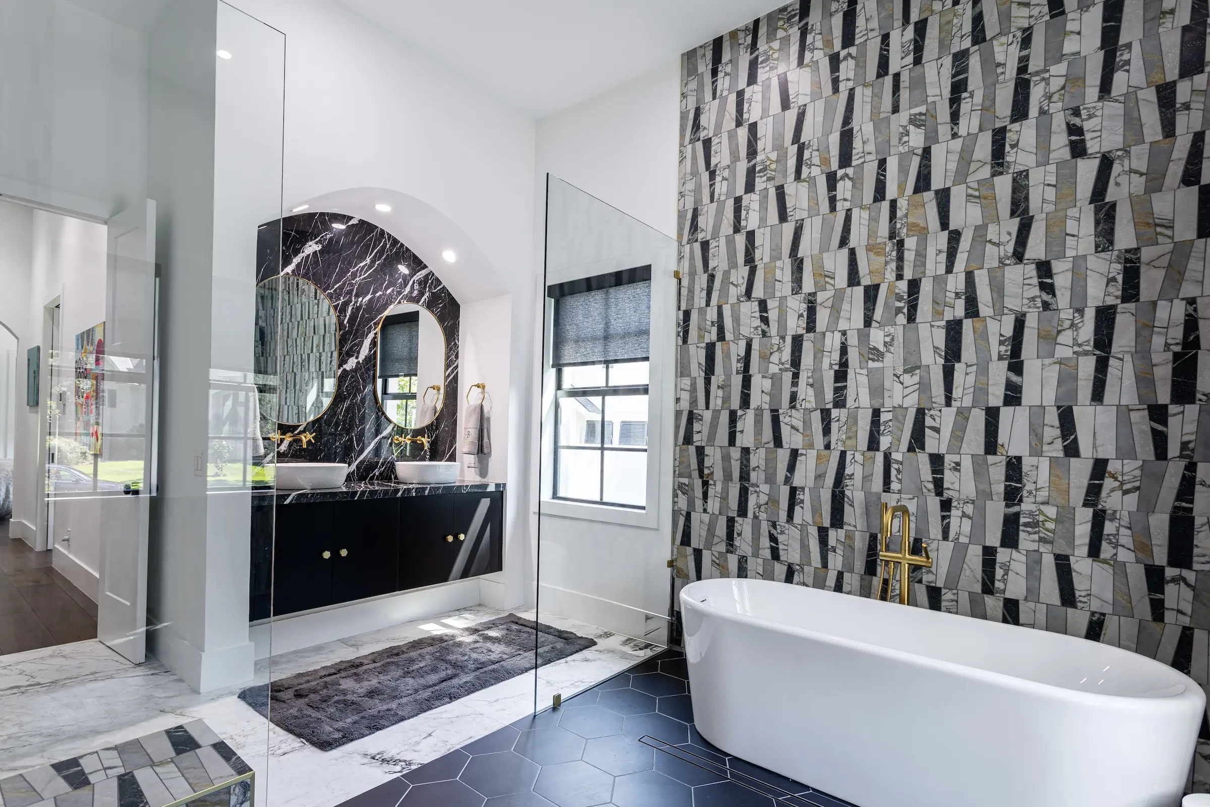 Shadow & Light completed powder room with face-pattern wallpaper