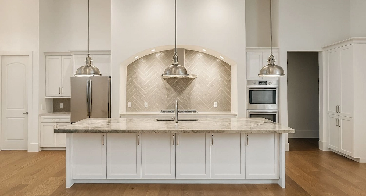 This project embraces a timeless transitional style—where classic forms meet modern simplicity. Soft... — Portfolio project by M&H Construction and Design.